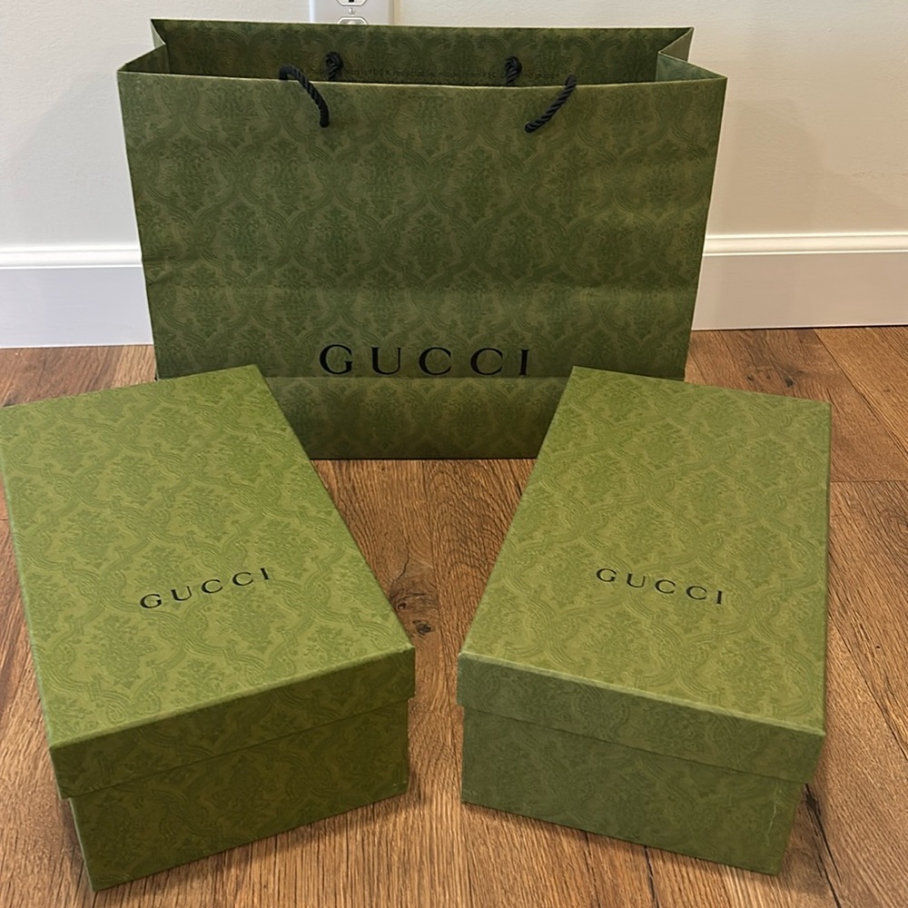 Gucci shoe box and shopping bag